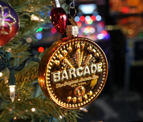 Holiday Tree Ornament that looks like a Barcade Token